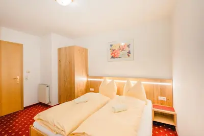 Ein Bett oder Betten in einem Zimmer der Unterkunft Apartmenthaus Kuchelberg