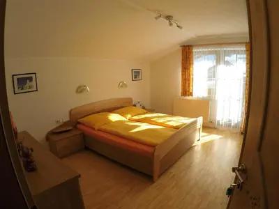 Ein Bett oder Betten in einem Zimmer der Unterkunft Ferienwohnung GIA