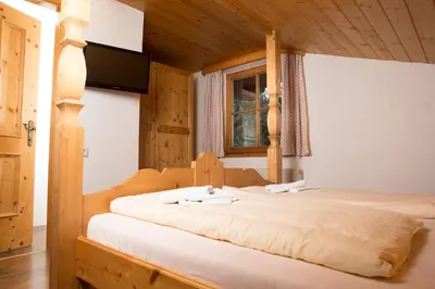 Ein Bett oder Betten in einem Zimmer der Unterkunft Glonerbauer Apartment