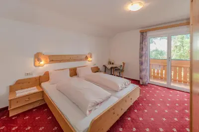 Ein Bett oder Betten in einem Zimmer der Unterkunft Ferienhaus Evi