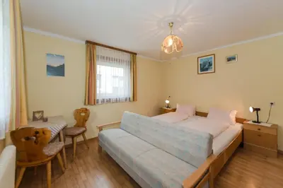 Ein Bett oder Betten in einem Zimmer der Unterkunft Ferienhaus Evi