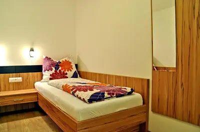 Ein Bett oder Betten in einem Zimmer der Unterkunft Hansalgut
