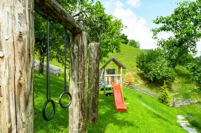 Ein Kinderspielbereich in der Unterkunft Kendlhof