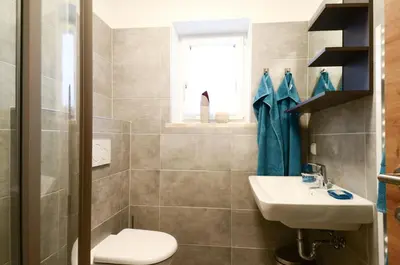 Ein Badezimmer in der Unterkunft Appartements Hitzenbichler