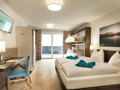 Ein Sitzbereich in der Unterkunft Hotel Sportwelt