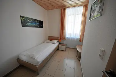 Ein Bett oder Betten in einem Zimmer der Unterkunft Apartements Wallner