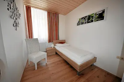 Ein Bett oder Betten in einem Zimmer der Unterkunft Apartements Wallner
