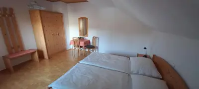 Ein Bett oder Betten in einem Zimmer der Unterkunft Ferienwohnung Weitgasser