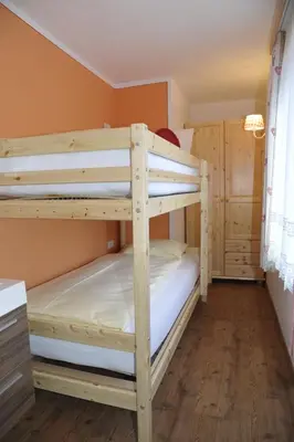 Ein Bett oder Betten in einem Zimmer der Unterkunft Ferienhaus Aloisia