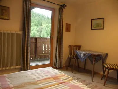 Ein Bett oder Betten in einem Zimmer der Unterkunft Ferienwohnung Peter Egger