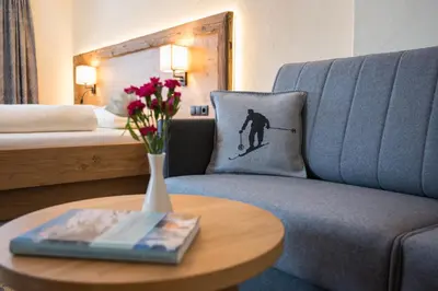 Ein Bett oder Betten in einem Zimmer der Unterkunft Aparthotel Weningeralm