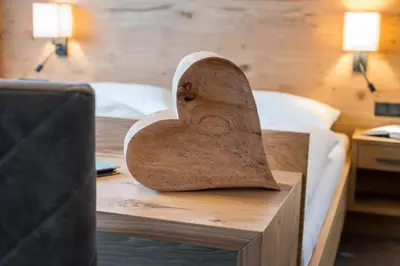 Ein Bett oder Betten in einem Zimmer der Unterkunft Aparthotel Weningeralm