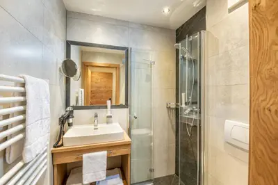 Ein Badezimmer in der Unterkunft Aparthotel Weningeralm