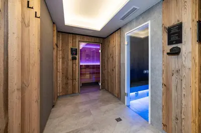 Ein Bett oder Betten in einem Zimmer der Unterkunft Aparthotel Weningeralm