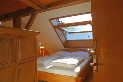 Ein Bett oder Betten in einem Zimmer der Unterkunft Haus Leopold