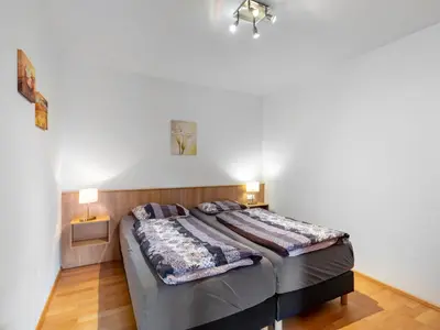 Ein Bett oder Betten in einem Zimmer der Unterkunft Apartment Top 5 by Interhome