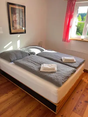 Ein Bett oder Betten in einem Zimmer der Unterkunft Ferienhaus Borth