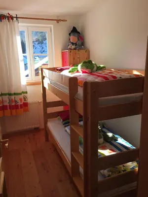 Ein Bett oder Betten in einem Zimmer der Unterkunft Ferienhaus Borth