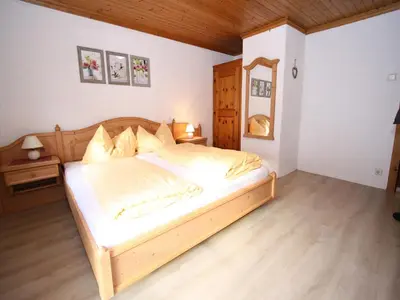 Ein Bett oder Betten in einem Zimmer der Unterkunft Sprawling Mansion near Ski Area in Salzburg