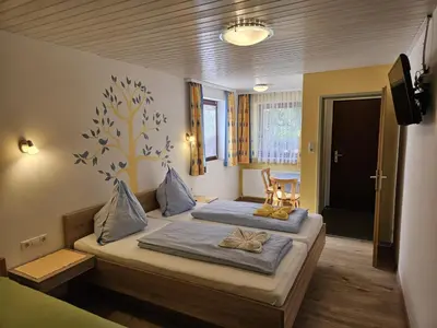 Ein Bett oder Betten in einem Zimmer der Unterkunft Alpengasthof Draxler