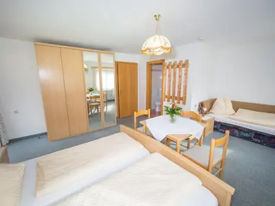 Ein Bett oder Betten in einem Zimmer der Unterkunft Alpengasthof Draxler