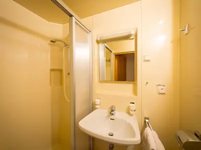 Ein Badezimmer in der Unterkunft Alpengasthof Draxler