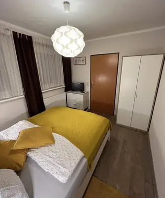 Ein Bett oder Betten in einem Zimmer der Unterkunft Südhang FeWo