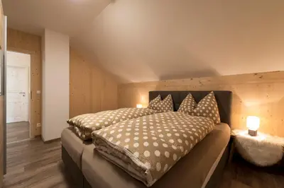 Ein Bett oder Betten in einem Zimmer der Unterkunft Haus Loserblick