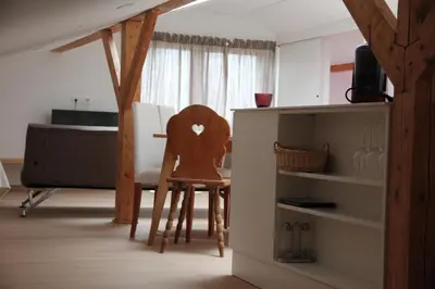 Ein Sitzbereich in der Unterkunft Appartement Aich-Assach