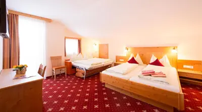 Ein Bett oder Betten in einem Zimmer der Unterkunft Pension Steiermark