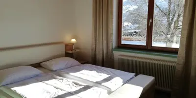 Ein Bett oder Betten in einem Zimmer der Unterkunft Abenteuerhof
