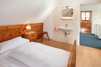 Ein Bett oder Betten in einem Zimmer der Unterkunft Abenteuerhof