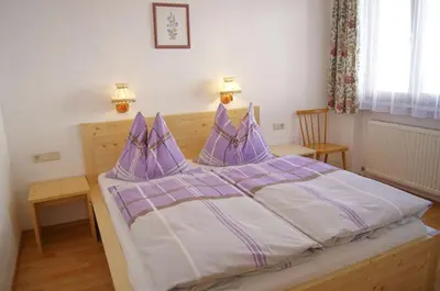 Ein Bett oder Betten in einem Zimmer der Unterkunft Haus Gsenger