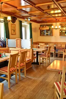 Ein Restaurant oder anderes Speiselokal in der Unterkunft Landgasthof zum Betenmacher