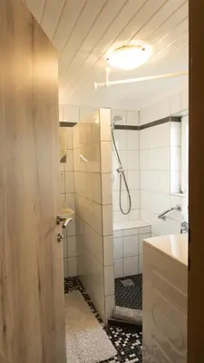 Ein Badezimmer in der Unterkunft Peterlhaus