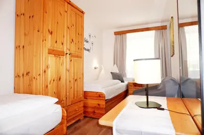 Ein Bett oder Betten in einem Zimmer der Unterkunft Ferienwohnung Aignerhof