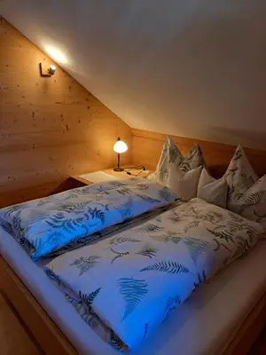 Ein Bett oder Betten in einem Zimmer der Unterkunft Ferienhof Brunbacher Wolfgangsee