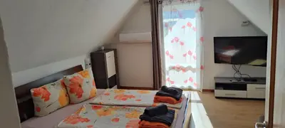Ein Bett oder Betten in einem Zimmer der Unterkunft Sofias Apartment