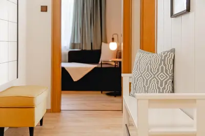 Ein Bett oder Betten in einem Zimmer der Unterkunft Ferienhaus Lechner am Waldrand mit Sauna, Bergblick und Naturgarten