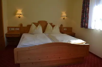Ein Bett oder Betten in einem Zimmer der Unterkunft Holiday-Appartements