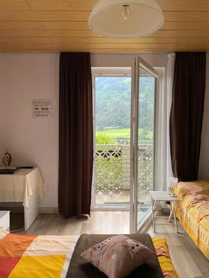 Ein Bett oder Betten in einem Zimmer der Unterkunft Gasthaus Zum Stadtwald