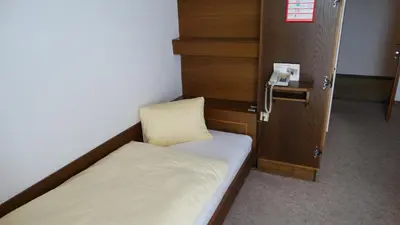 Ein Bett oder Betten in einem Zimmer der Unterkunft Gasthof Dickinger