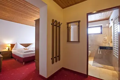 Ein Bett oder Betten in einem Zimmer der Unterkunft Landhotel Agathawirt