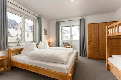 Ein Bett oder Betten in einem Zimmer der Unterkunft Appartmenthaus Centro by Schladming-Appartements