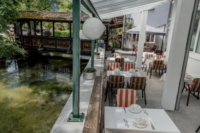Ein Restaurant oder anderes Speiselokal in der Unterkunft Wohlfühlhotel Goiserer Mühle
