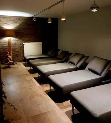 Ein Sitzbereich in der Unterkunft Hotel Kristall