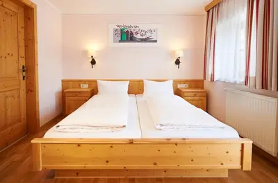 Ein Bett oder Betten in einem Zimmer der Unterkunft Ferienanlage Reithof