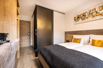 Ein Bett oder Betten in einem Zimmer der Unterkunft Der Burgblick-Adults Only