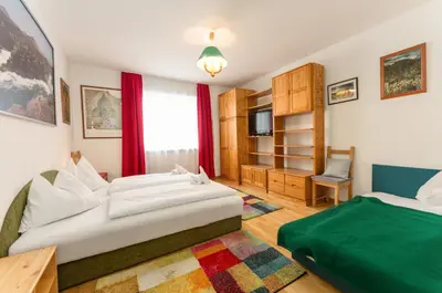 Ein Bett oder Betten in einem Zimmer der Unterkunft Ferienwohnungen Karoline by Schladming-Appartements