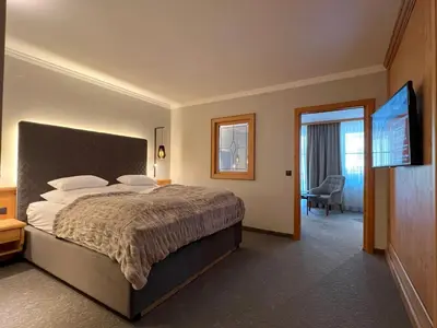 Ein Bett oder Betten in einem Zimmer der Unterkunft Superior Hotel Panorama